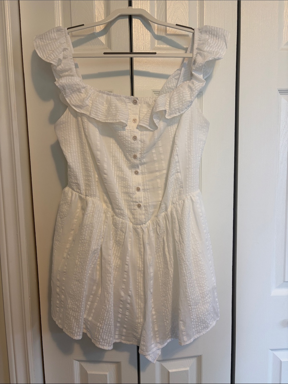 White Ruffled Button Romper